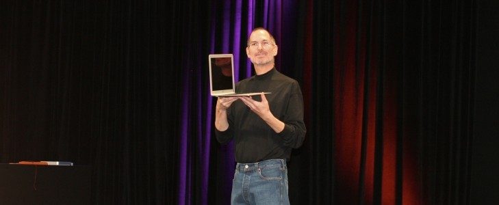Steve Jobs holding MacBook Air Steve Jobs and MacBook Air