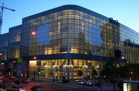 Moscone West, covered banners can be seen on the second and third floors.
