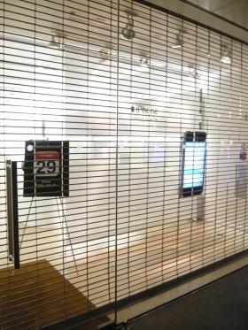 Complete view of iPhone display at front of store | Courtesy of flickr user sminman2005