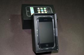Open iPhone packaging showing iPhone