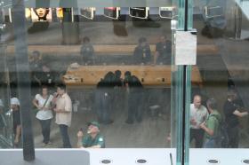 Staff in New York, Fifth Avenue Apple Store play with newly installed iPhones | Courtesy AppleInsider